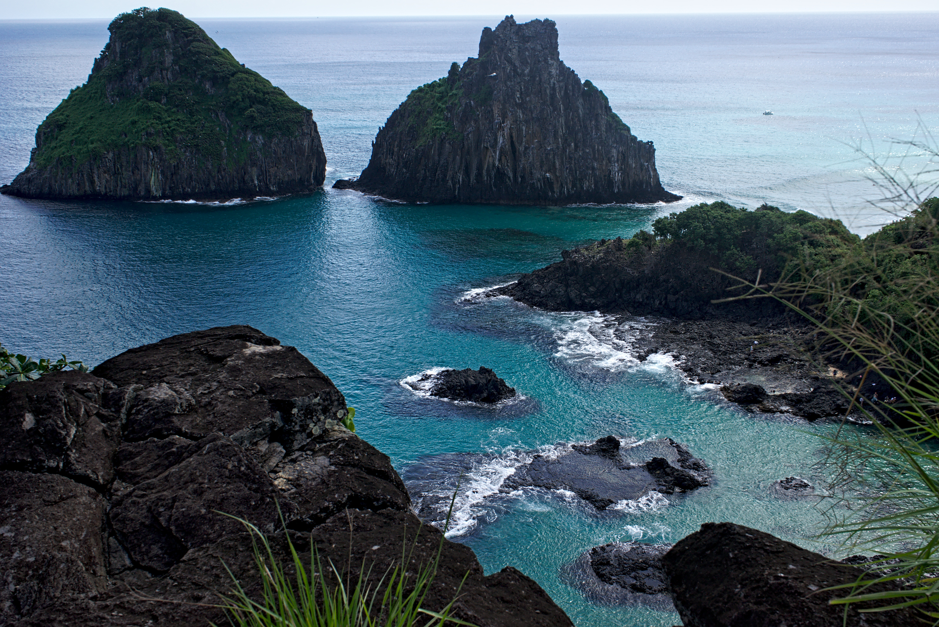 Morro Dois Irmãos twin-peak rock formation viewed from Baía dos Porcos