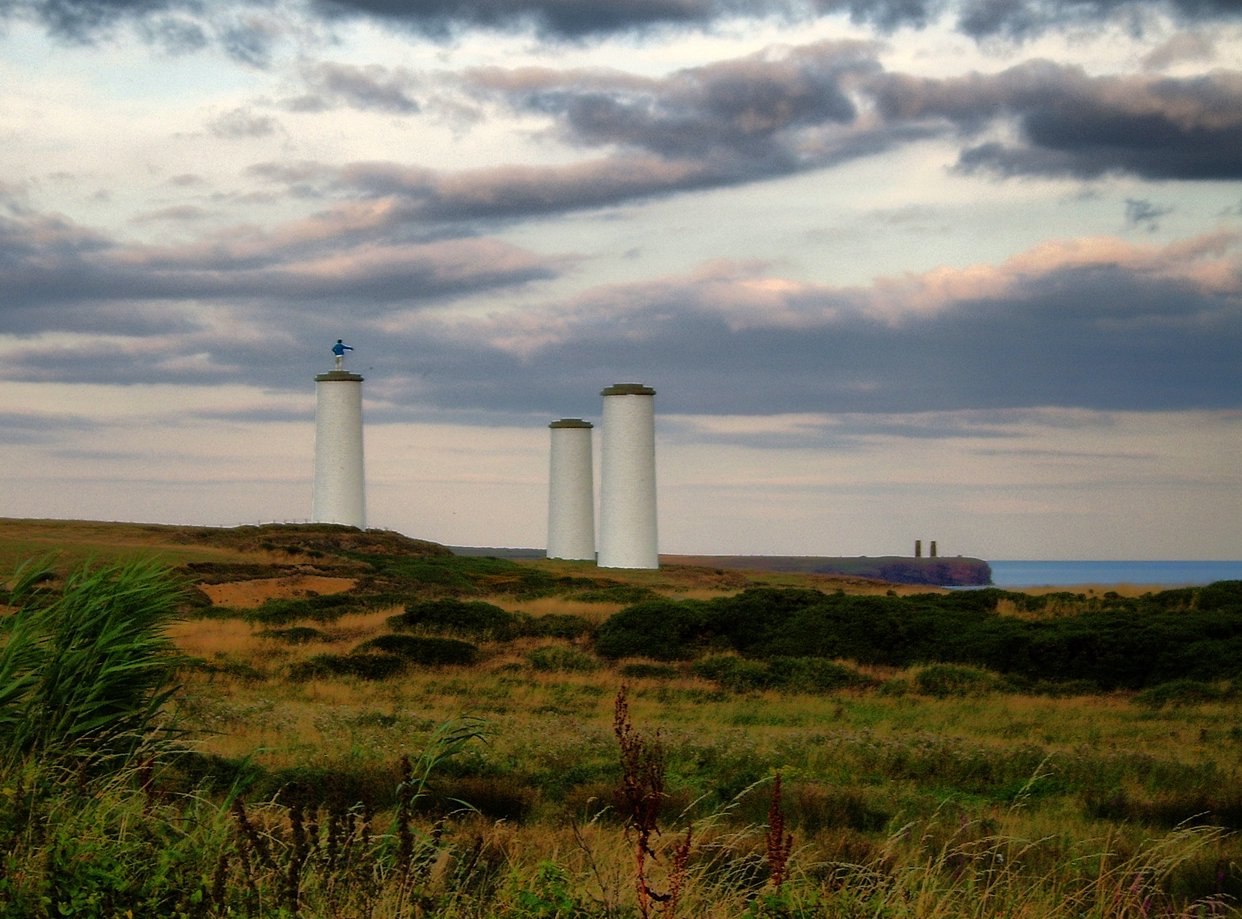 The Metal Man and beacons at Great Newtown Head, Tramore
