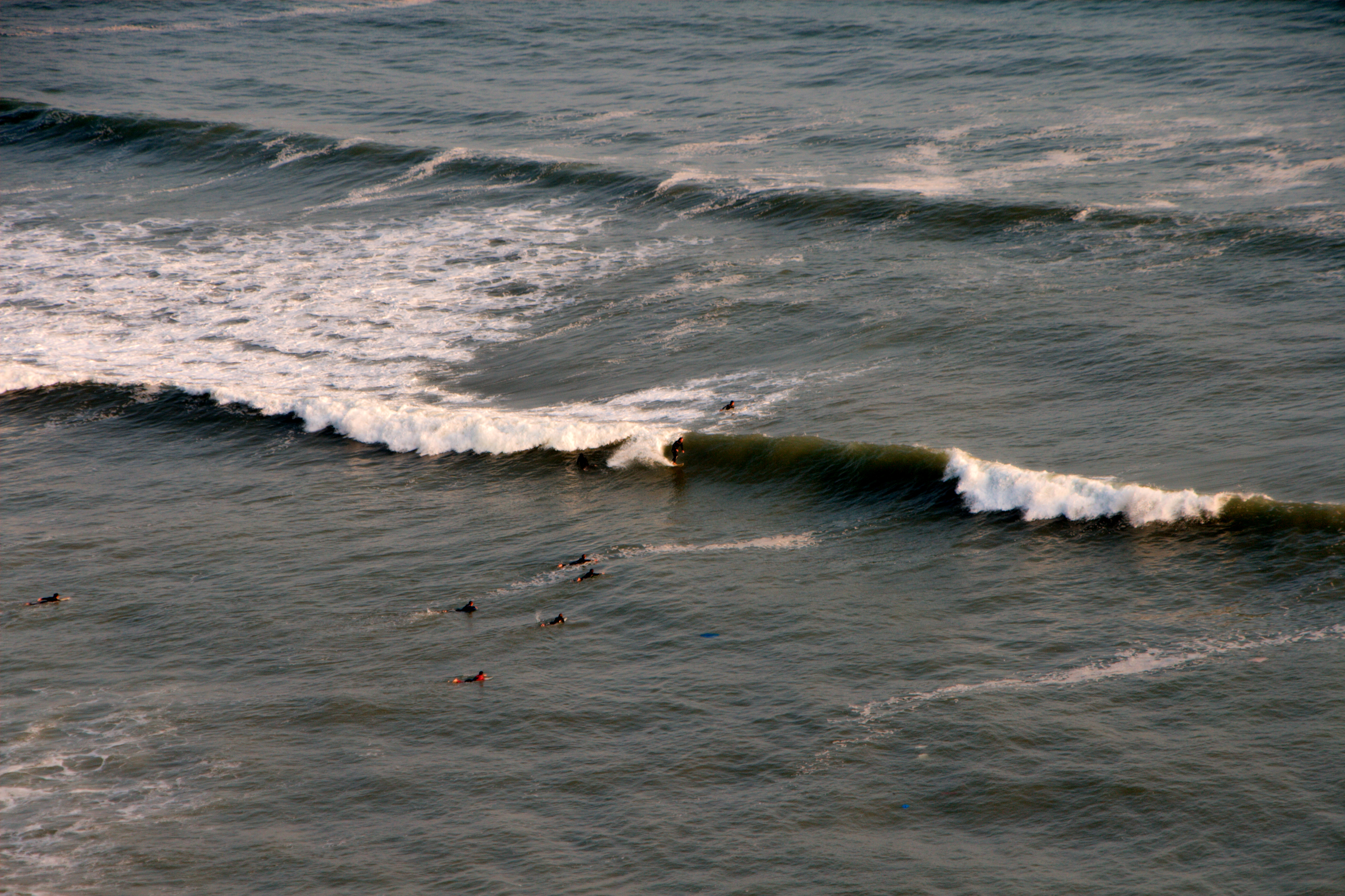 Surfers along the Miraflores coastline, Lima