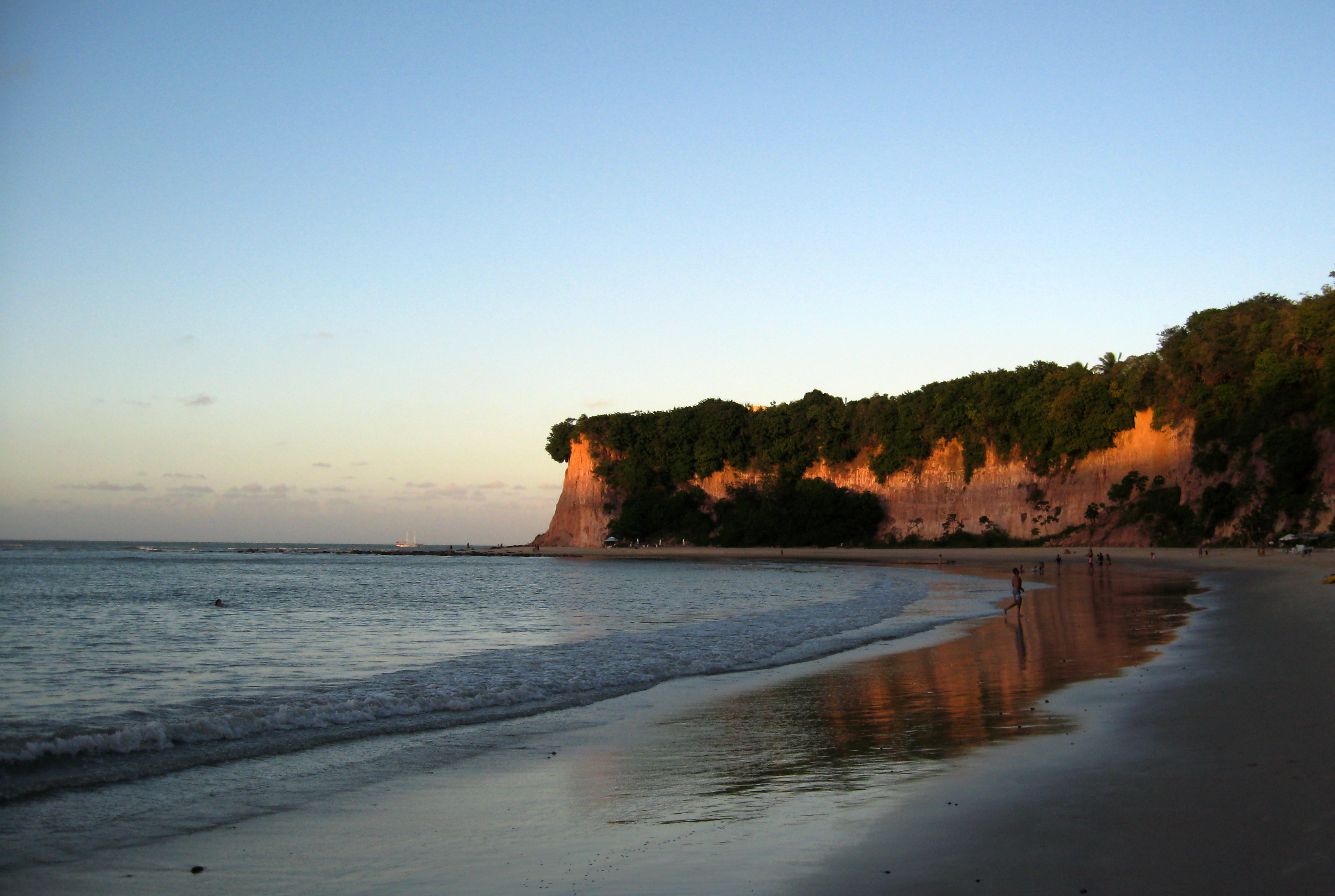 Evening light over Dolphin Bay (Baía dos Golfinhos) and its cliffs in Pipa, Rio Grande do Norte, Brazil