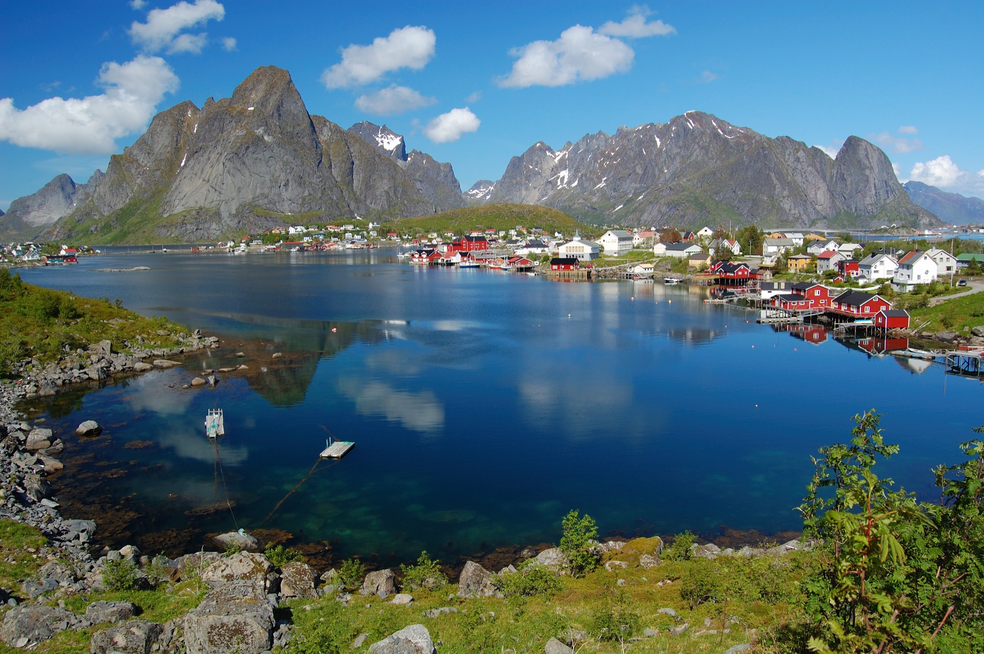 Reine fishing village against mountain peaks, Lofoten, Norway