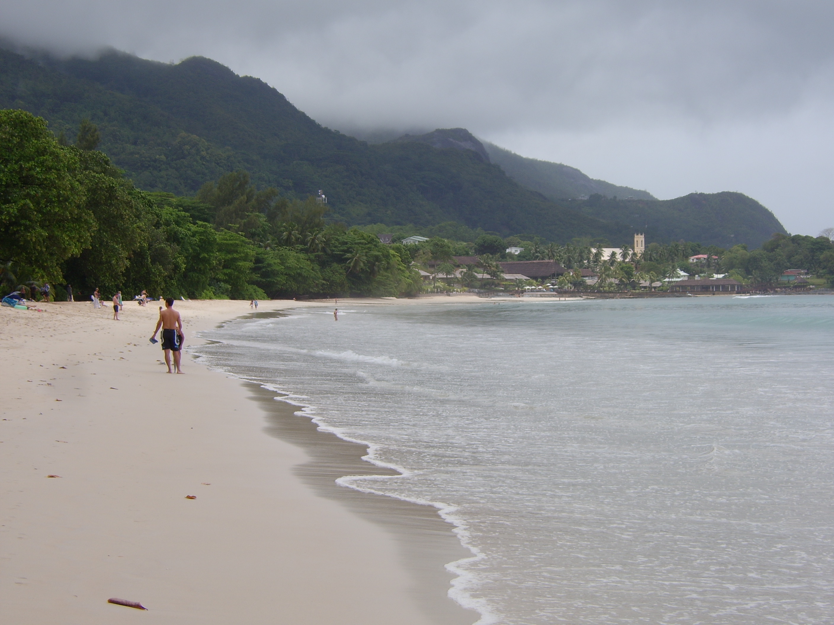 White sand and calm turquoise water at Beau Vallon Beach on Mahé, Seychelles