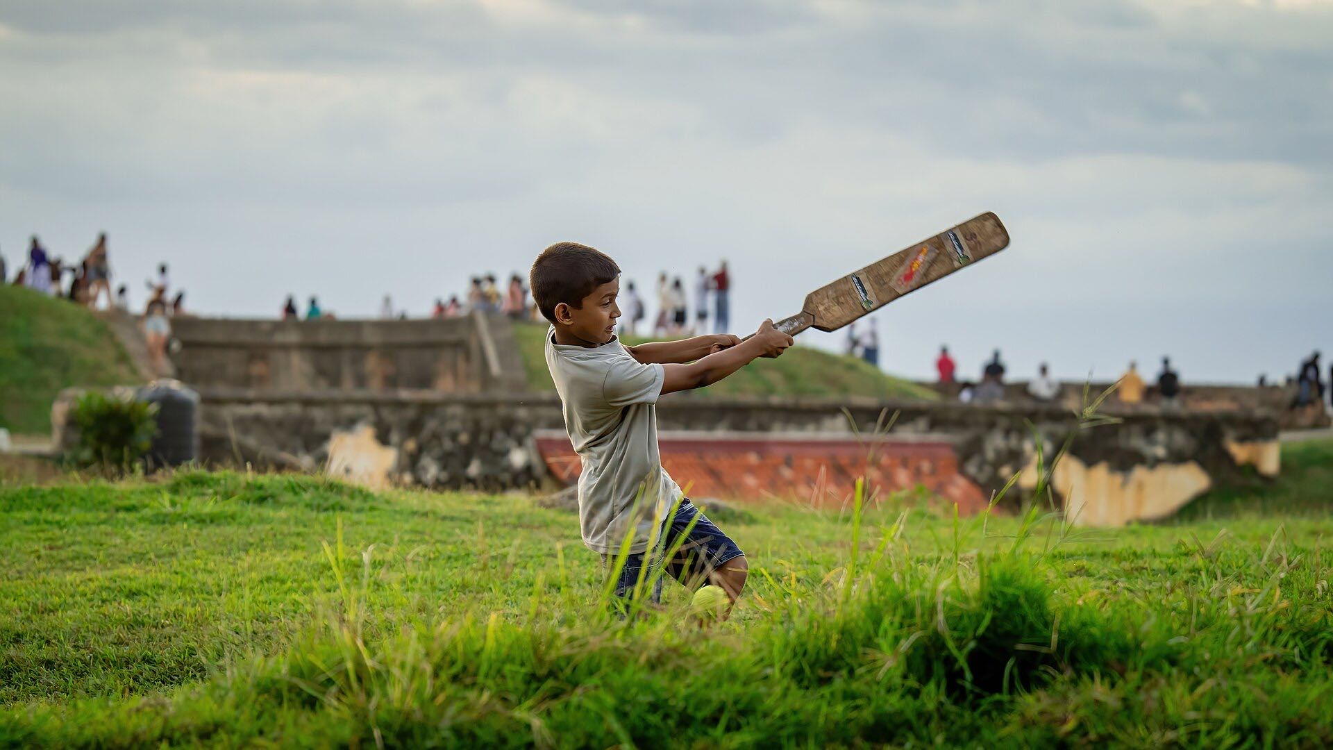 Cricket being played on the green inside Galle Fort, southern Sri Lanka
