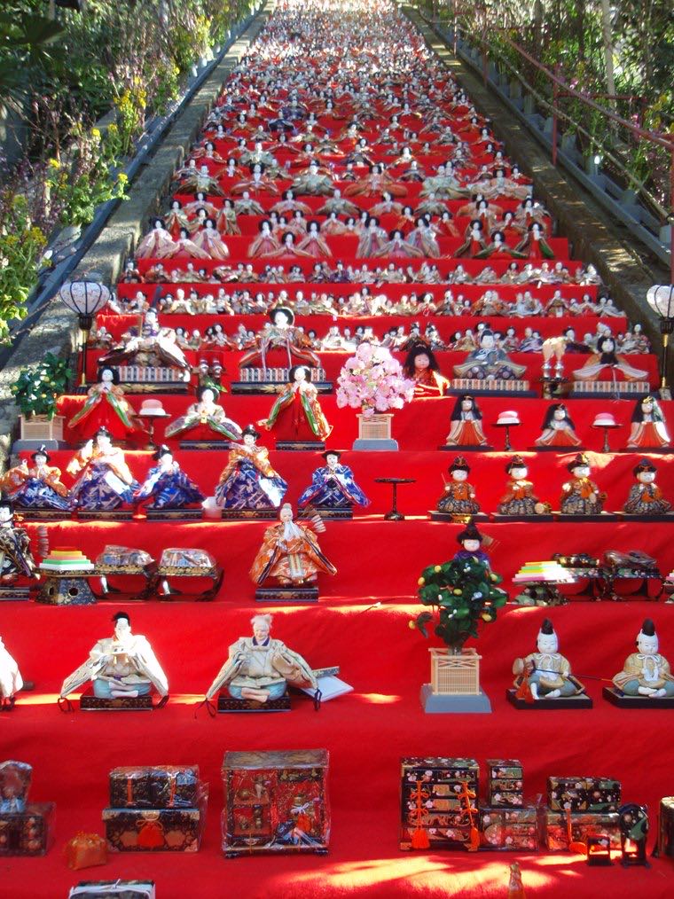 Hina dolls banked up the shrine stairway at the Katsuura Big Hina Matsuri, Chiba, Japan
