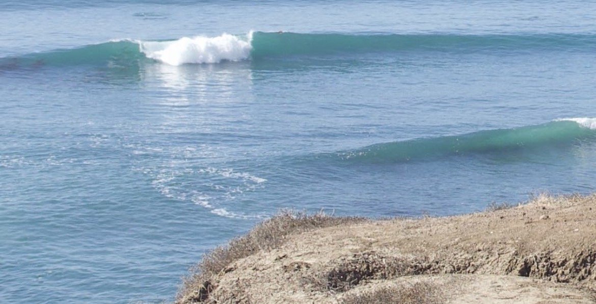 Clean wave peeling along a remote Baja point during an Eat Sleep Surf expedition