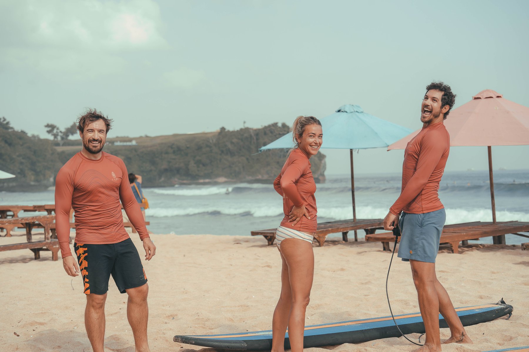 CARI Surf Camp guides and guests on the beach