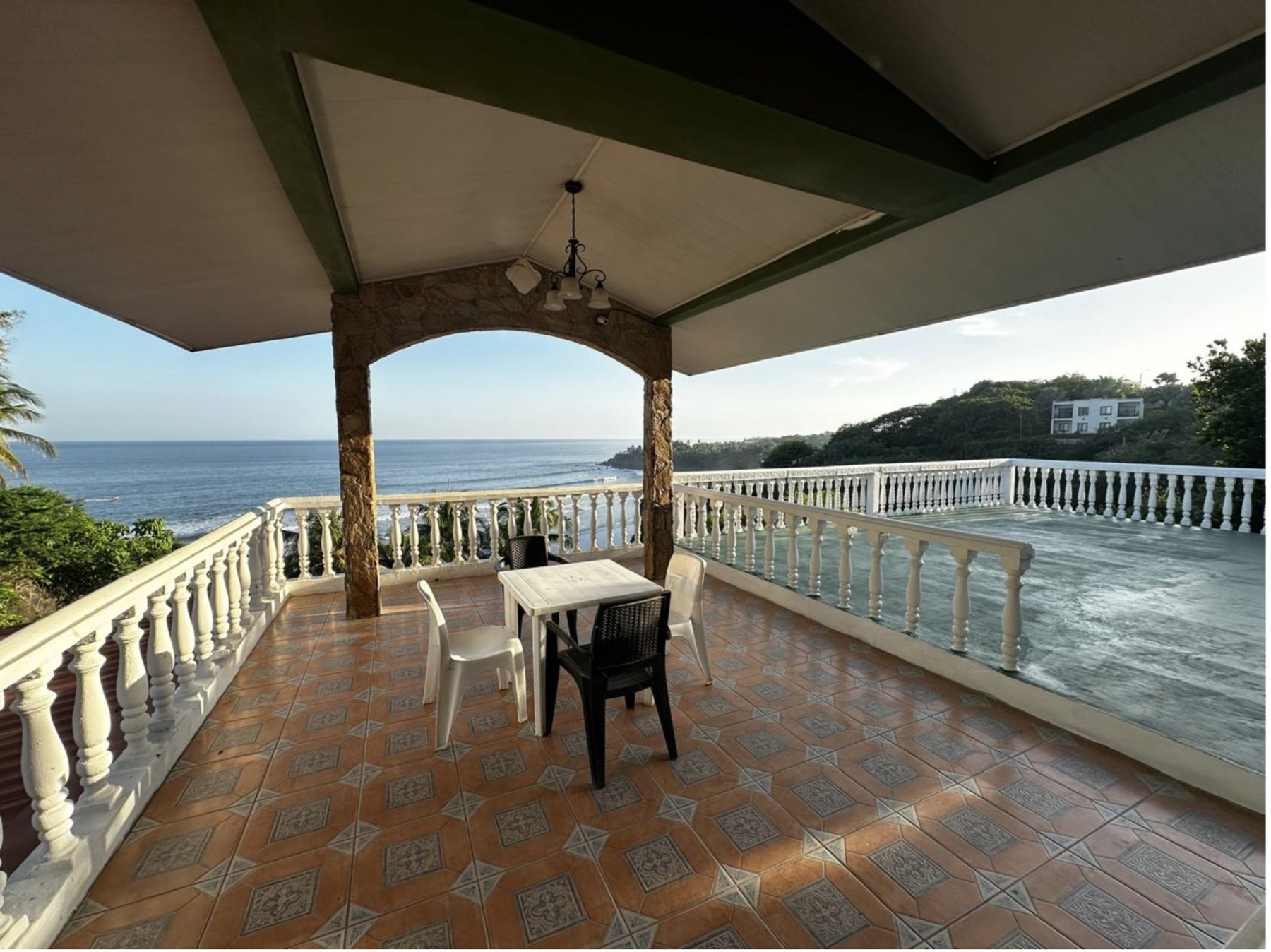 Ocean-view terrace at Rancho Infinito Beach House, Playa Las Flores