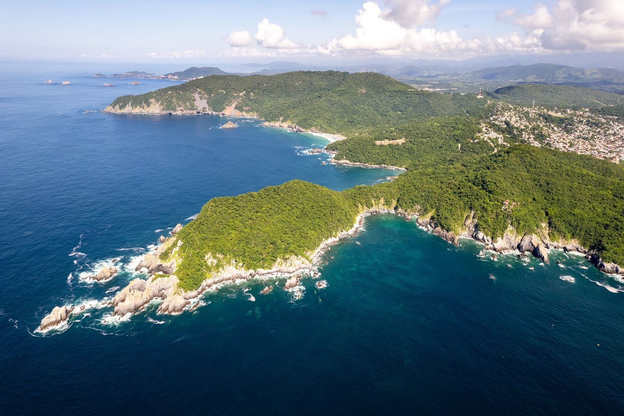 Aerial view of the forested Zihuatanejo coastline and bays
