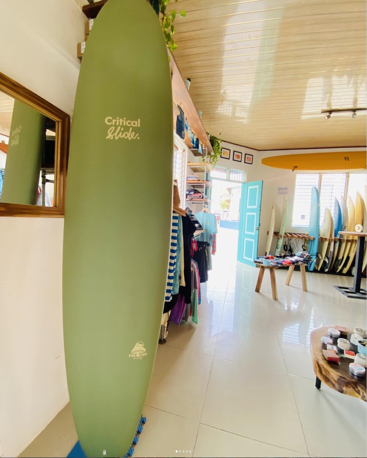 Inside Ocean Fly Surf Shop, boards and apparel on display
